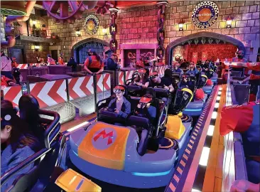  ?? BRADY MACDONALD — STAFF ?? The Mario Kart: Bowser's Challenge's augmented reality dark ride at Universal Studios Hollywood will debut today.