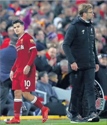  ??  ?? CADA UNO POR SU LADO. Coutinho, en una imagen reciente junto a Jürgen Klopp.