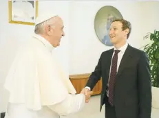  ?? (Osservator­e Romano/Reuters) ?? POPE FRANCIS greets Facebook CEO Mark Zuckerberg yesterday during a meeting at the Vatican.