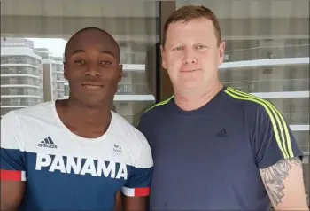  ??  ?? Darren Browne with Panama sprinter and Olympic 200m finalist Alonso Edward.