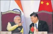  ?? AFP FILE PHOTO ?? A file photo of Chinese President Xi Jinping with Prime Minister Narendra Modi at the Brics Summit in October 2016.