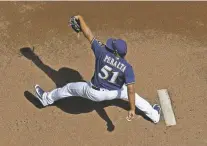  ?? MORRY GASH/ASSOCIATED PRESS ?? Brewers starting pitcher Freddy Peralta threw seven scoreless innings in Milwaukee’s 4-0 win over the Reds on Wednesday in Milwaukee.