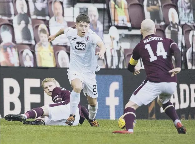  ??  ?? 0 Raith winger Kai Kennedy, on loan from Rangers, was a constant threat to Hearts. Below inset, Christophe Berra, who had to go off with a pulled hamstring