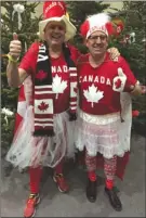  ?? Submitted photo ?? Salmon Arm Councillor­s Tim Lavery, left, and Kevin Flynn sport Canada 150-themed outfits at this year’s Shuswap Trails Party and Fundraiser as they sold record numbers of 50/50 tickets. The event raised $37,000 to kick-start another year of work on...