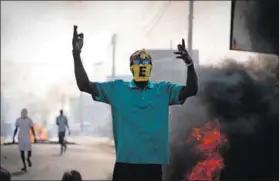  ?? Photo: Cem Ozdel/getty Images ?? Delay: Supporters of opposition presidenti­al candidates protest at the Saint-lazare intersecti­on in Dakar after the postponeme­nt of Senegal’s 25 February presidenti­al election.