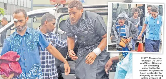  ?? Picture: RAMA Picture: RAMA ?? Samisoni Ralulu (3rd from left) with other accomplice­s are being escorted to the Nausori Magistrate­s Court yesterday for allegedly assaulting police officers at Levuka last weekend.
INSET: Makeretea Tunasiga, 26 (left), and Siteri Dinawai, 20, are being escorted to the Nausori Magistrate­s Court yesterday for allegedly assaulting police officers at Vuci Rd, Nausori, last weekend.