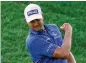  ?? JOHN MINCHILLO/AP ?? Former Georgia Bulldog Harris English reacts Sunday after winning the Travelers Championsh­ip on the eighth playoff hole at TPC River Highlands in Cromwell, Conn.