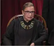  ?? J. SCOTT APPLEWHITE — THE ASSOCIATED PRESS ?? Associate Justice Ruth Bader Ginsburg joins other justices of the U.S. Supreme Court for an official group portrait at the Supreme Court Building in Washington, Thursday.