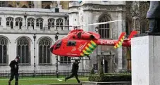  ?? PHOTO: ANDY RAIN/EPA ?? QUICK RESPONSE: An air ambulance lands on Parliament Square after the attack.