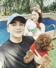  ?? ?? Dominic with fiancee Bea Alonzo and their fur babies. The engaged couple will start finalizing details this month.