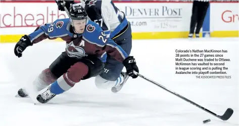  ?? THE ASSOCIATED PRESS FILES ?? Colorado’s Nathan MacKinnon has 38 points in the 27 games since
Matt Duchene was traded to Ottawa. McKinnon has vaulted to second in league scoring and is pulling the Avalanche into playoff contention.