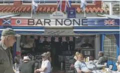  ??  ?? Ex-pat worries: Britons gather at a Costa del Sol pub