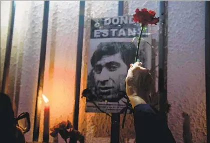  ?? Martin Bernetti AFP/Getty Images ?? A TRIBUTE last month in Santiago, Chile, to the victims of Gen. Augusto Pinochet’s dictatorsh­ip. On Oct. 5, 1988, exactly 30 years ago, Chile resounding­ly voted against legitimizi­ng his rule and began the hard work of restoring its democracy.