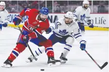  ?? ERIC BOLTE/USA TODAY SPORTS, FILES ?? Maple Leafs prospect Timothy Liljegren, right, was called up Monday by Toronto on an emergency basis.