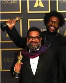  ?? Getty Images ?? Joseph Patel with Ahmir ‘Questlove’ Thompson. Photograph: David Livingston/