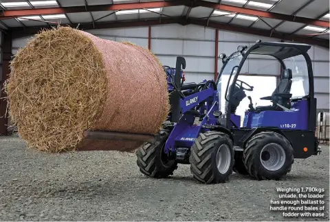  ??  ?? Weighing 1,790kgs unlade, the loader has enough ballast to handle round bales of fodder with ease