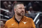  ?? MICHAEL THOMAS — THE ASSOCIATED PRESS ?? Texas head coach Chris Beard looks on during the first half against UTEP on Nov. 7in Austin, Texas. Travis County District Attorney Jose Garza on Wednesday moved to dismiss a felony domestic violence case against Beard.