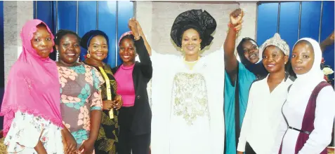  ?? PHOTO: NAN ?? APC presidenti­al aspirant, Uju Kennedy- Ohanenye ( middle) with members of the Associatio­n of Nigerian Female Students, during their visit to the aspirant in Abuja… yesterday.