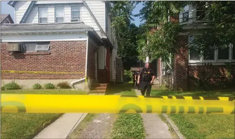  ?? ISAAC AVILUCEA — THE TRENTONIAN ?? Cops roped off a home on the 1400block of West State Street after a woman was shot.