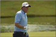  ?? BRANDON DILL — THE ASSOCIATED PRESS ?? Phil Mickelson gestures to fans on the 18th hole during the final round of the St. Jude Classic golf tournament, Sunday, June 11, 2017 in Memphis, Tenn.