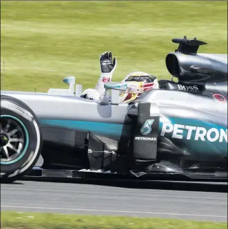  ??  ?? Hamilton became first British driver to win a hat-trick of British GPS at Silverston­e