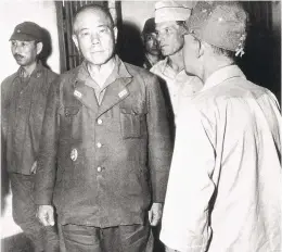  ?? AP FILE ?? The gates of New Bilibid Prison, near Manila, Philippine­s on Sept. 16, 1945, are closed behind General Tomoyuki Yamashita, commander of all Japanese force in Manila.