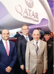  ??  ?? Akbar Al-Baker, chief executive of Qatar Airways Group, right, gestures with Saoud bin Abdulrahma­n Al-Thani, ambassador of the State of Qatar in Germany, left, and the Mayor of Berlin, Michael Müller, center, at the opening day of ITB exhibition in...