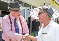  ??  ?? Lee O'Donnell (left) shakes hands with Bevan Kammholz before the main race.