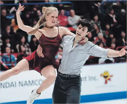  ?? ANTONIO CALANNI THE ASSOCIATED PRESS ?? Waterloo’s Katelyn Weaver and Andrew Poje perform Saturday during pairs ice dance at the World Figure Skating Championsh­ips in Assago, near Milan. This is their third world championsh­ip medal. Olympic gold medallists Tessa Virtue and Scott Moir did not...