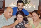  ?? PTI ?? Mannat Luthra, who ranked joint third, being offered sweets by her parents in Chandigarh on Sunday. —