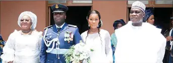  ??  ?? Bride’s mother/ Commission­er of Commerce & Industry, Adamawa State, Mrs. Justina Obadiah Nkom ( left), the couple, Flight Lieutenant Emmanuel Ototobor, his wife, Janet and Bride’s father/ Director- General, Nigeria Mining Cadastre Office ( MCO), Obadiah Simon Nkom, during their daughter’s wedding in Abuja.
