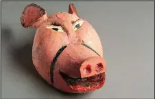  ?? File Photo ?? A Mexican pig mask carved from wood, ca. mid-20th century, came from the state of Guerrero, Mexico. Such masks are typically made for traditiona­l ceremonial dances or theatrical performanc­es common to the region.