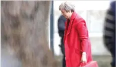  ??  ?? SIMON DAWSON/REUTERS Britain’s Prime Minister Theresa May returns to Downing Street in London, Britain, on November 12, 2018.