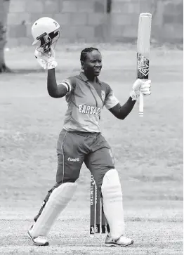  ?? CWI MEDIA PHOTO ?? Barbados Women’s batman Kyshona Knight celebrates after reaching her hundred against Jamaica Women in the West Indies Women’s Super50 Cup yesterday at the Conaree Sports Club in St Kitts.