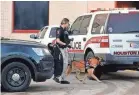  ?? AP ?? A school district Police K-9 unit responds to a shooting Tuesday at Bellaire High School in Texas.