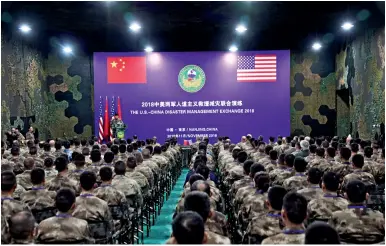  ??  ?? The U.S. Army and China’s People’s Liberation Army (PLA) military personnel attend a closing ceremony of an exercise of Disaster Management Exchange near Nanjing, Jiangsu Province in November 2018.