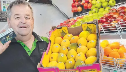  ??  ?? SWEET SAVIOR: Gundy Quality Fruit and Veg owner Dennis Smith knew his business was going broke thanks to the Covid lockdown so launched a new scheme that has tripled the number of customers walking into his shop.