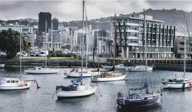  ?? MAARTEN HOLL/THE POST ?? The Clyde Quay Wharf apartments in Wellington Harbour are described as “the Everest” of Pete McGuinness’ engineerin­g career.