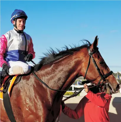  ?? Picture: Pauline Herman Photograph­y. ?? EASY WIN. Dorset Noble returns to the winner’s enclosure with Craig Zackey in the irons after victory in the Listed World Sports Betting East Cape Derby over 2400m at Fairview on Saturday.