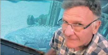  ??  ?? OLD FRIENDS: Lloyd Mackay visits the brindle bass he gave to uShaka Sea World, celebratin­g the moment with a selfie.