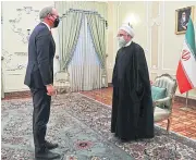  ?? AFP ?? President Hassan Rouhani, right, receives Irish Minister for Foreign Affairs Simon Coveney in the Iranian capital Tehran.