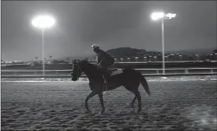  ?? Justin Sullivan Getty Images ?? A RIDER WORKS out a horse at Golden Gate Fields in the Bay Area. The track is set to close next summer, and the ramificati­ons of that could be felt by other tracks throughout the state.