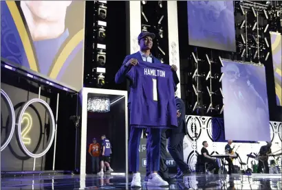  ?? Tribune News Service/getty Images ?? Kyle Hamilton onstage after being selected 14th overall by the Baltimore Ravens during the first round of the NFL Draft last week.