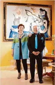  ?? Liz Hafalia/The Chronicle ?? Maria Manetti Shrem and Jan Shrem in 2016 with the Picasso painting “Femme nue couchée avec un chat” which they sold in 2023 to benefit the arts and other philanthro­py.