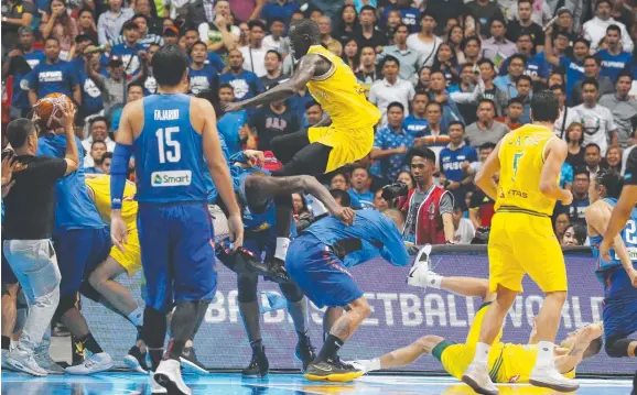  ?? Picture: AP ?? Philippine­s and Australian players react during their FIBA World Cup qualifying basketball game at the Philippine Arena.