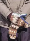  ?? JONATHAN ERNST/ POOL PHOTO VIA ASSOCIATED PRESS ?? U.S. Sen. Bernie Sanders, I-Vt., wears mittens as he attends President Joe Biden’s inaugurati­on ceremony Jan. 20 at the U.S. Capitol in Washington.