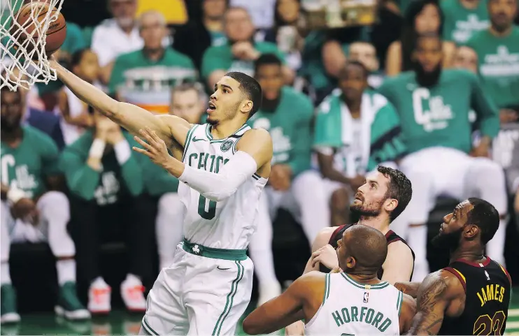  ?? GETTY IMAGES ?? Jayson Tatum scored 24 points to lead the Celtics to a 96-83 win over the Cleveland Cavaliers in Game 5 of the Eastern Conference final Wednesday in Boston.