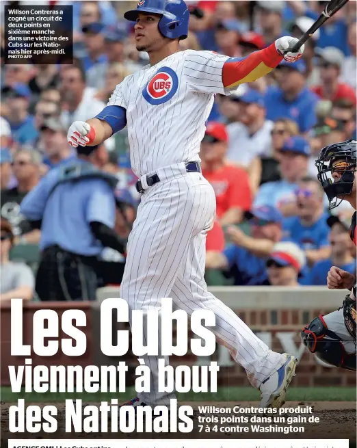  ?? PHOTO AFP ?? Willson Contreras a cogné un circuit de deux points en sixième manche dans une victoire des Cubs sur les Nationals hier après-midi.