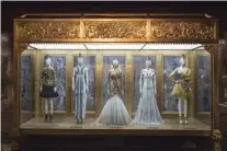  ??  ?? Display at the
Alexander McQueen: Savage Beauty
exhibition