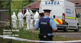  ??  ?? Search: Gardaí forensic experts at the farmhouse